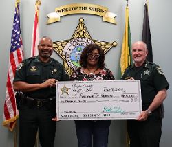 FCSO donates $10K to support Rise Above the Violence